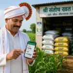 Indian farmer checking fertilizer price on mobile in farm